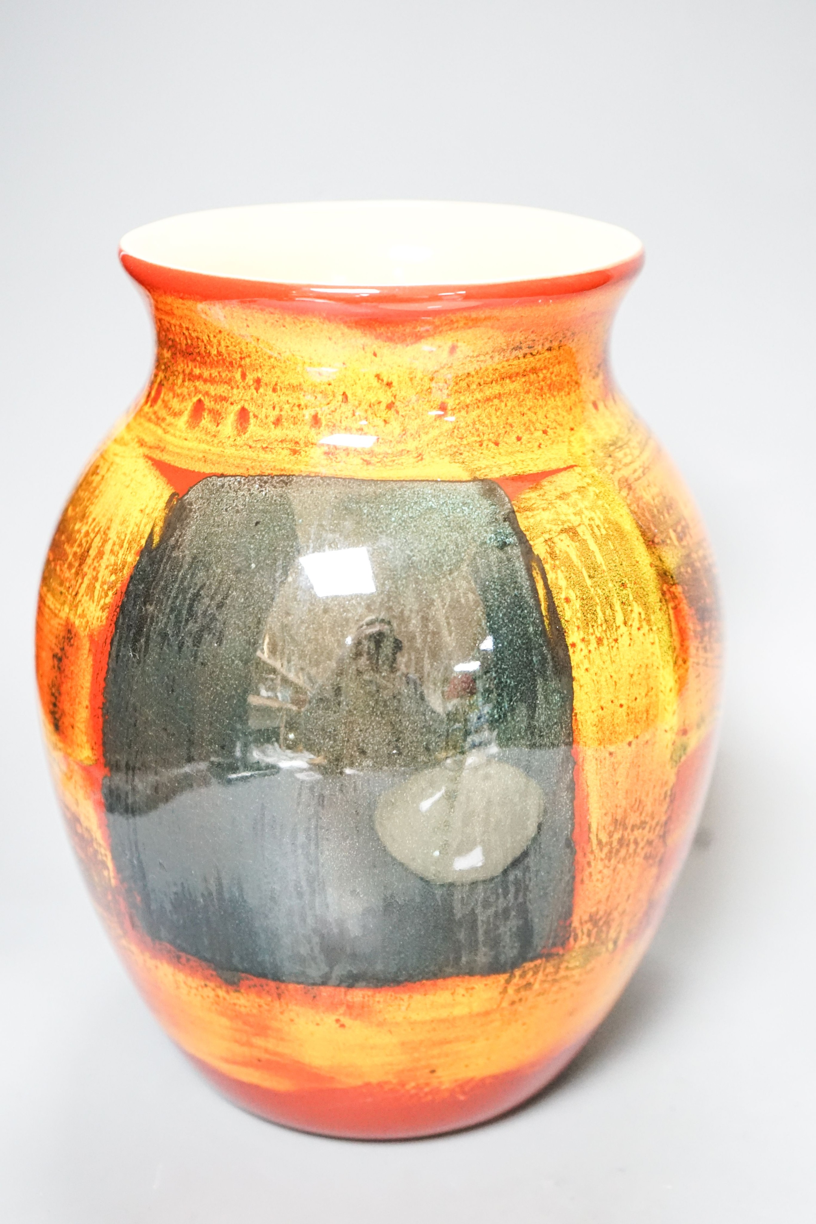 A Poole pottery vase and a shallow dish 27cm